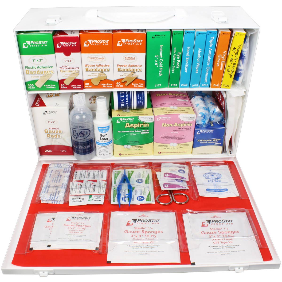 Open first aid kit displaying various medical supplies including bandages, antiseptics, and aspirin for emergencies.